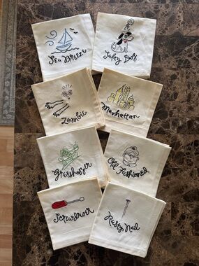 Pottery Barn Cream Cocktail Napkins with Black Script (Set of Eight)